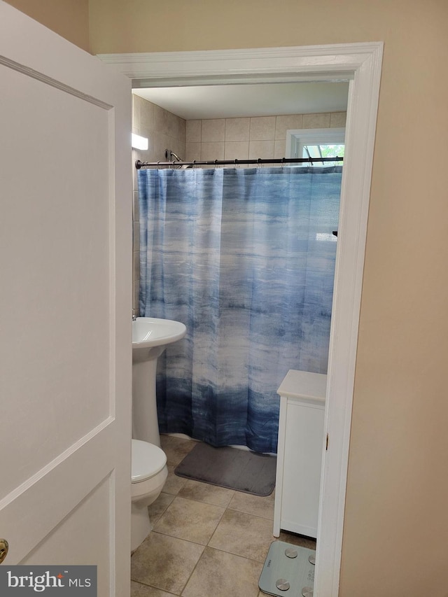 424 Exton Rd, Hatboro, PA 19040 - bathroom with tile patterned floors, toilet, and a shower with shower curtain