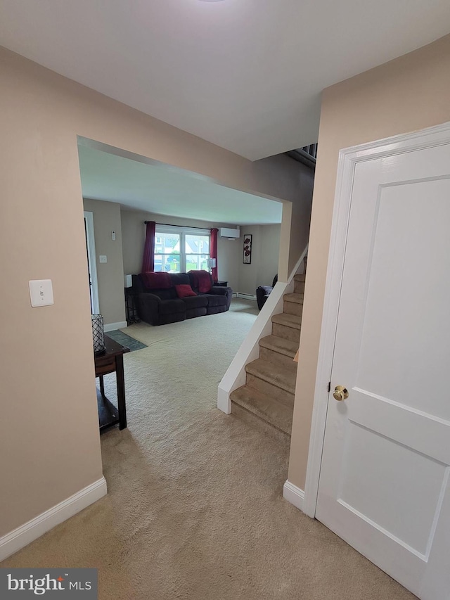 424 Exton Rd, Hatboro, PA 19040 - stairs featuring carpet flooring, a wall mounted air conditioner, baseboards, and a baseboard heating unit