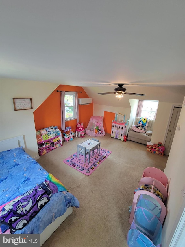 424 Exton Rd, Hatboro, PA 19040 - bedroom featuring lofted ceiling, carpet flooring, a wall unit AC, and ceiling fan