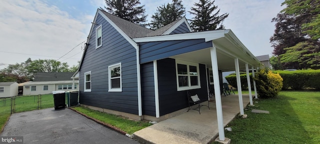 424 Exton Rd, Hatboro, PA 19040 - view of home's exterior with a gate and a shingled roof