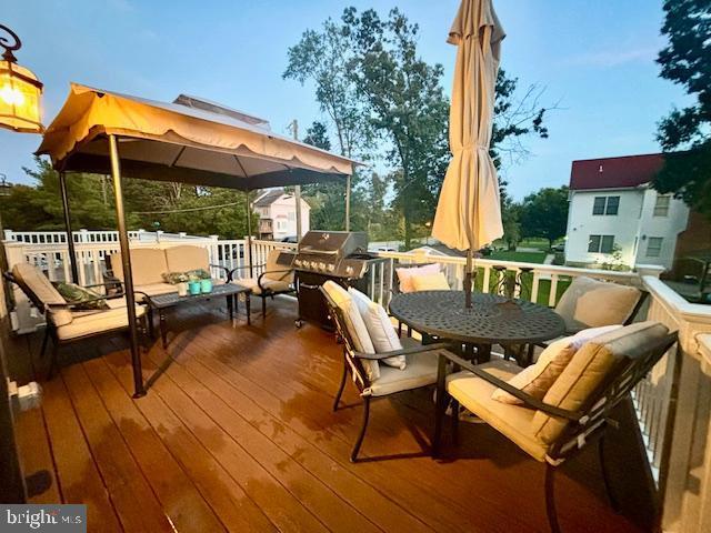 45401 Daveno Sq, Sterling, VA 20164 - deck featuring a gazebo, area for grilling, and an outdoor living space
