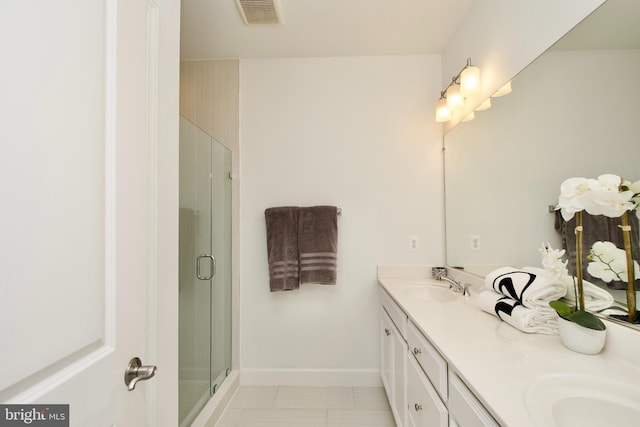 45401 Daveno Sq, Sterling, VA 20164 - full bathroom featuring double vanity, a stall shower, and baseboards