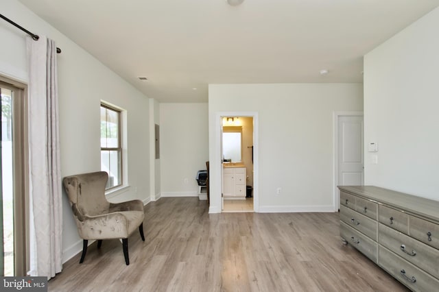 45401 Daveno Sq, Sterling, VA 20164 - sitting room featuring light wood-style flooring, healthy amount of natural light, and baseboards