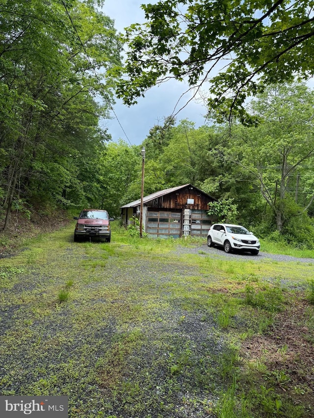 22015 Waterfall Rd, Three Springs, PA 17264 - view of yard with a wooded view and an outbuilding