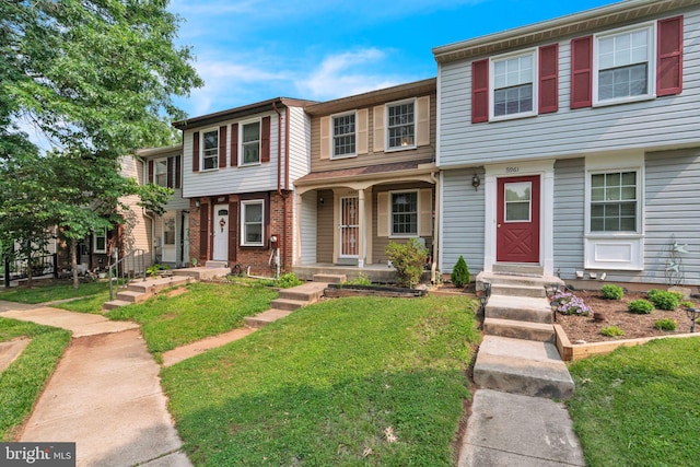 5959 Rowanberry Dr Unit 8E, Elkridge, MD 21075 - view of property with a front lawn and brick siding