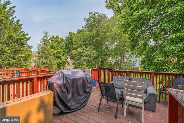 5959 Rowanberry Dr Unit 8E, Elkridge, MD 21075 - wooden terrace featuring outdoor dining area, grilling area, and view of scattered trees