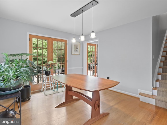 3725 N Delaware St, Arlington, VA 22207 - dining area with stairs, wood finished floors, baseboards, and french doors