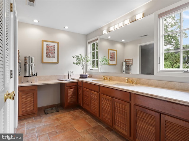 3725 N Delaware St, Arlington, VA 22207 - bathroom with double vanity, stone finish floors, and recessed lighting
