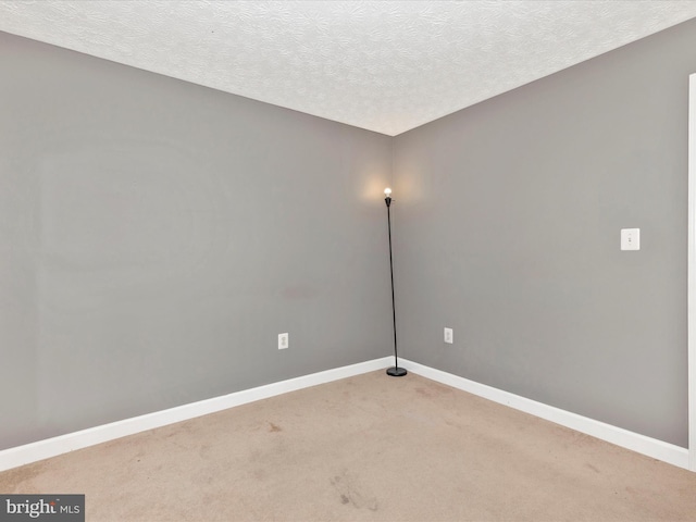 6505 Springwater Ct Unit 7103, Frederick, MD 21701 - unfurnished room with a textured ceiling, light colored carpet, and baseboards