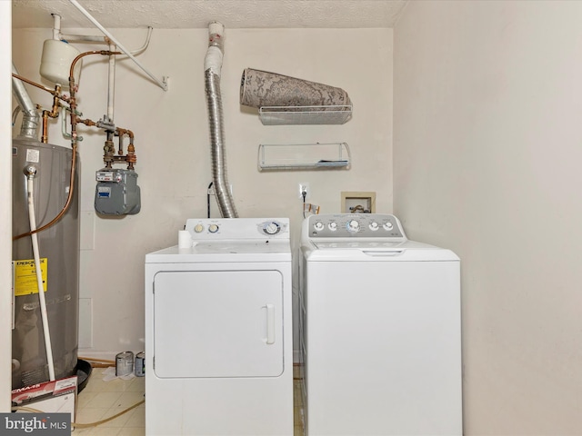 6505 Springwater Ct Unit 7103, Frederick, MD 21701 - laundry room with washing machine and clothes dryer and water heater