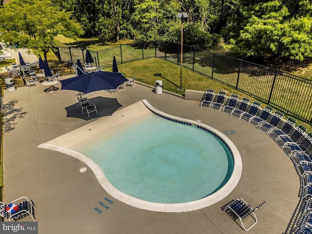 6505 Springwater Ct Unit 7103, Frederick, MD 21701 - view of pool with a patio and view of wooded area
