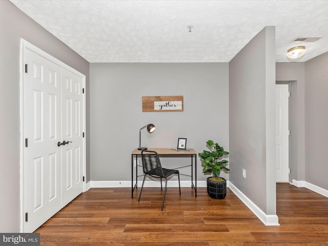 6505 Springwater Ct Unit 7103, Frederick, MD 21701 - office featuring wood finished floors, baseboards, and a textured ceiling