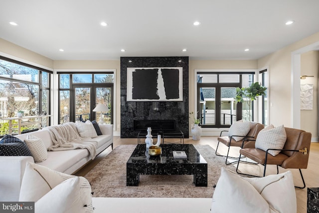1573 Westmoreland St, Mclean, VA 22101 - living area featuring wood finished floors, a fireplace, and recessed lighting