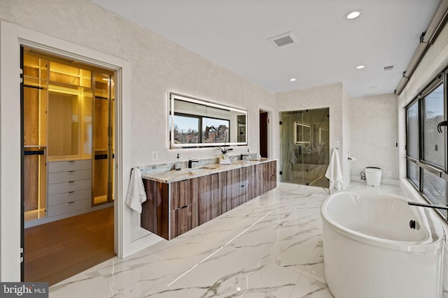 1573 Westmoreland St, Mclean, VA 22101 - full bath featuring a freestanding bath, a shower stall, double vanity, recessed lighting, and toilet