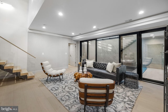 1573 Westmoreland St, Mclean, VA 22101 - living room with stairway, wood finished floors, recessed lighting, and baseboards