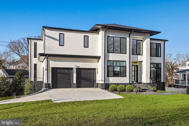 1573 Westmoreland St, Mclean, VA 22101 - contemporary house with stucco siding, stone siding, a front yard, a garage, and concrete driveway