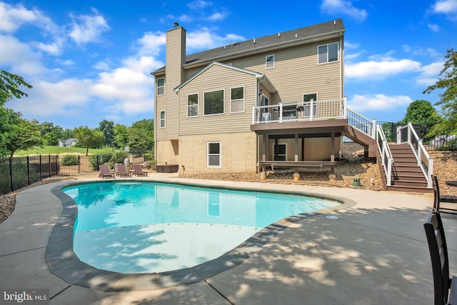 2058 Baythorne Rd, Prince Frederick, MD 20678 - view of swimming pool featuring stairs, a patio, and a deck