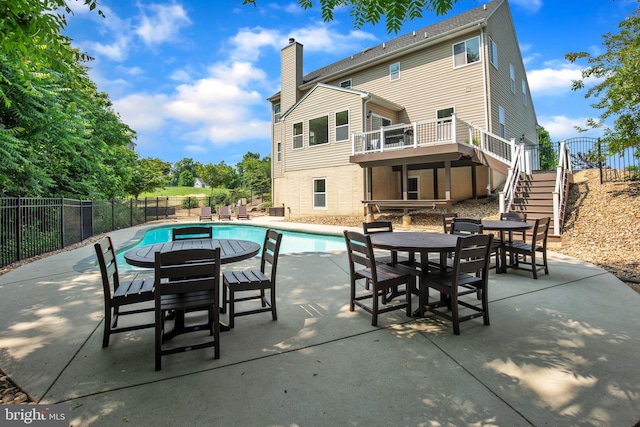 2058 Baythorne Rd, Prince Frederick, MD 20678 - view of pool with stairs, a patio area, outdoor dining space, and a wooden deck