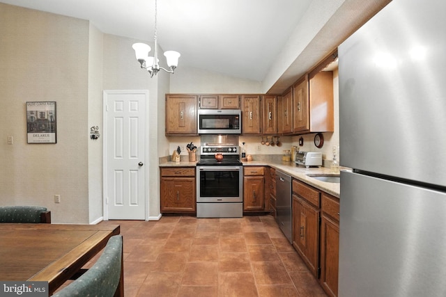 3382 Flint Hill Pl, Woodbridge, VA 22192 - kitchen with appliances with stainless steel finishes, a chandelier, vaulted ceiling, brown cabinets, and light countertops