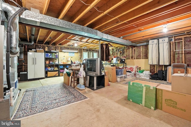 3382 Flint Hill Pl, Woodbridge, VA 22192 - unfinished basement with freestanding refrigerator, heating unit, and carpet floors