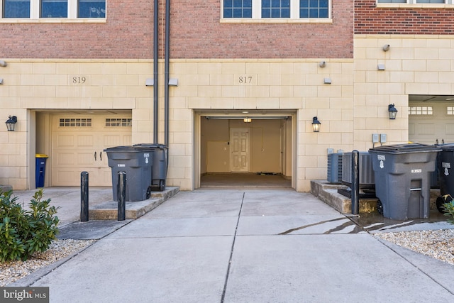 817 Fair Winds Way Unit 290, Oxon Hill, MD 20745 - garage featuring concrete driveway