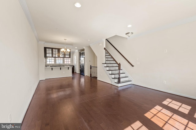817 Fair Winds Way Unit 290, Oxon Hill, MD 20745 - unfurnished living room with a chandelier, ornamental molding, stairway, dark wood-style floors, and baseboards