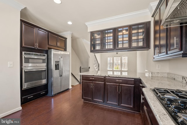 817 Fair Winds Way Unit 290, Oxon Hill, MD 20745 - kitchen featuring stainless steel appliances, ornamental molding, dark brown cabinets, light stone counters, and recessed lighting