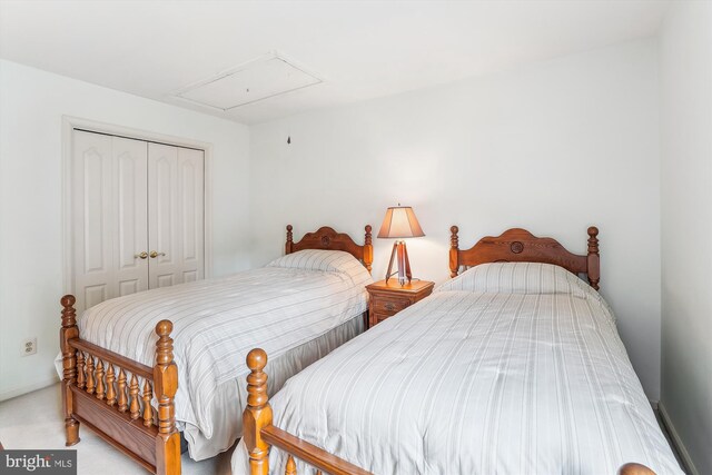 9111 Oak Chase Ct, Fairfax Station, VA 22039 - bedroom with attic access, a closet, and carpet flooring