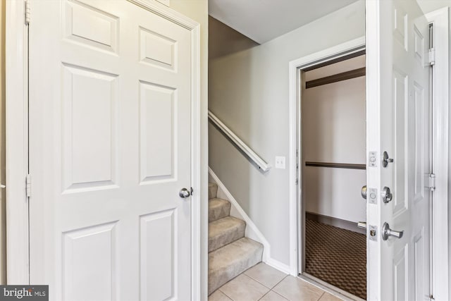 3851 Aristotle Ct Unit 1-412, Fairfax, VA 22030 - staircase with tile patterned flooring and baseboards