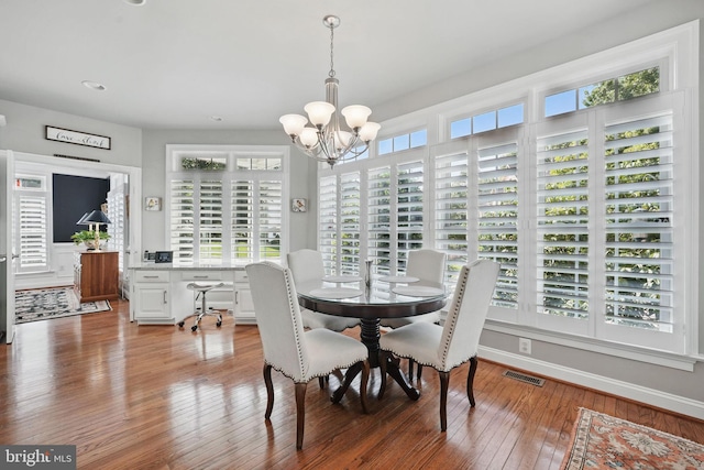 6321 Wilmington Dr, Burke, VA 22015 - dining area with a chandelier, wood-type flooring, and recessed lighting