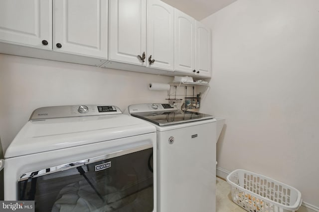 6321 Wilmington Dr, Burke, VA 22015 - laundry room with cabinet space and washing machine and dryer