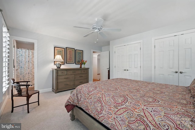 6321 Wilmington Dr, Burke, VA 22015 - bedroom with light colored carpet, multiple closets, and ceiling fan