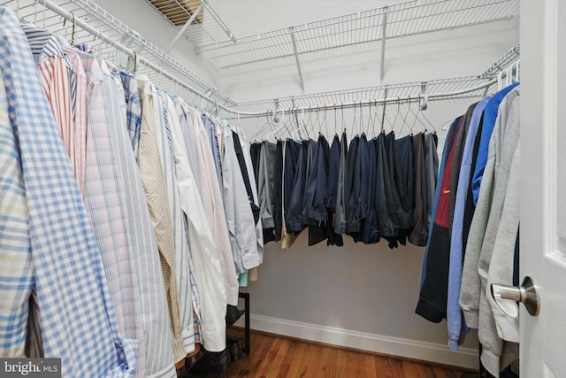 6321 Wilmington Dr, Burke, VA 22015 - walk in closet with wood finished floors
