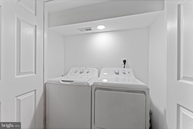 45571 Reading Ter, Sterling, VA 20166 - laundry room featuring independent washer and dryer