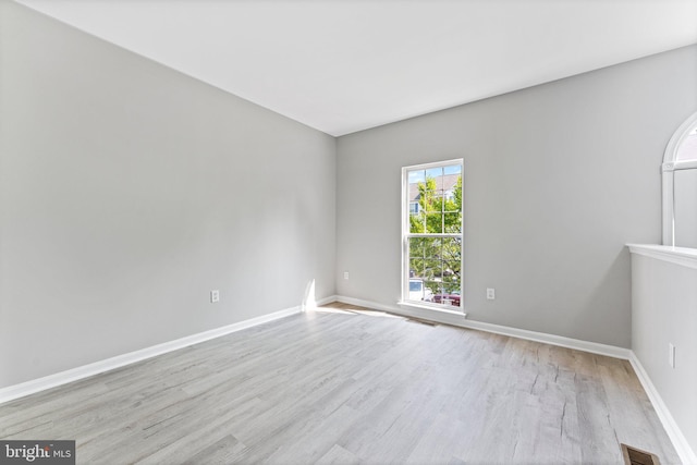 45571 Reading Ter, Sterling, VA 20166 - empty room with light wood-style floors and baseboards