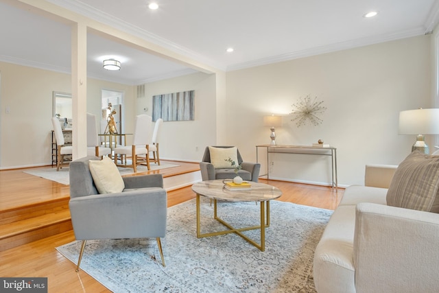 3134 Borge St, Oakton, VA 22124 - living area with wood finished floors, ornamental molding, and recessed lighting