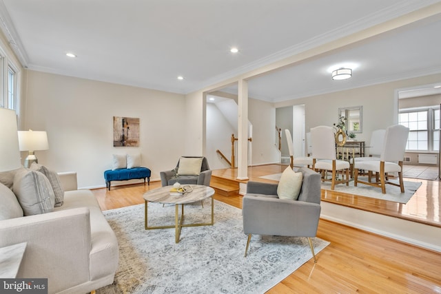 3134 Borge St, Oakton, VA 22124 - living room featuring stairs, wood finished floors, crown molding, and recessed lighting