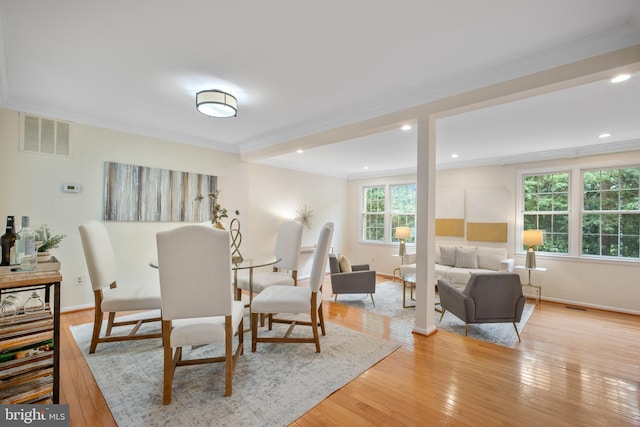 3134 Borge St, Oakton, VA 22124 - dining area featuring crown molding, light wood-style flooring, and recessed lighting