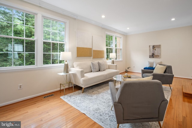 3134 Borge St, Oakton, VA 22124 - living room with ornamental molding, hardwood / wood-style flooring, and recessed lighting