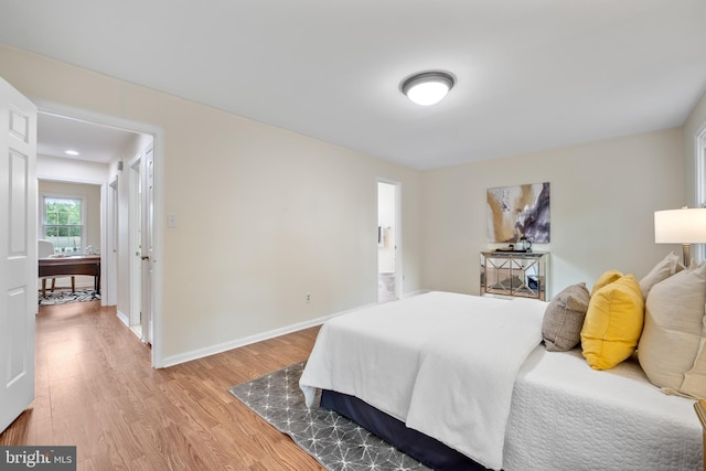 3134 Borge St, Oakton, VA 22124 - bedroom featuring light wood-style floors and baseboards