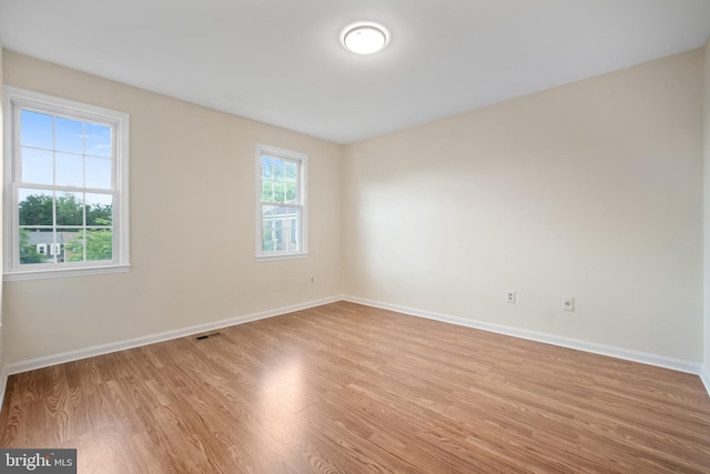 3134 Borge St, Oakton, VA 22124 - unfurnished room featuring light wood-style flooring and baseboards