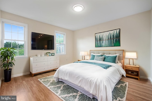 3134 Borge St, Oakton, VA 22124 - bedroom with light wood-style flooring