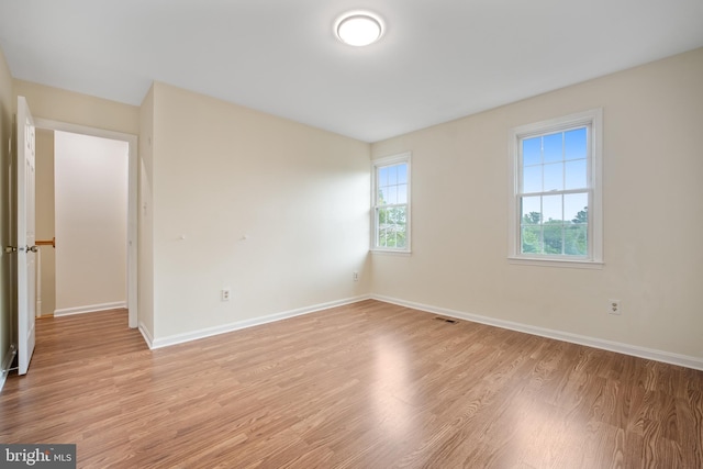 3134 Borge St, Oakton, VA 22124 - unfurnished room with light wood finished floors and baseboards