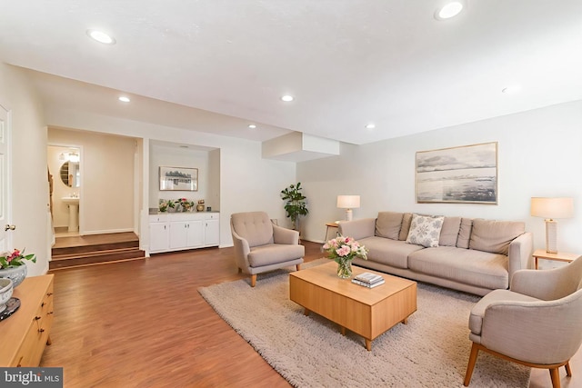 3134 Borge St, Oakton, VA 22124 - living area with light wood-style flooring and recessed lighting