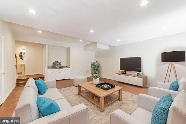 3134 Borge St, Oakton, VA 22124 - living room featuring light wood-style flooring and recessed lighting