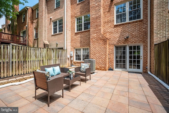 3134 Borge St, Oakton, VA 22124 - fenced backyard featuring outdoor lounge area and a patio
