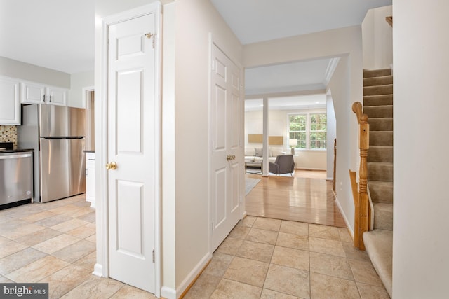 3134 Borge St, Oakton, VA 22124 - hallway with stairs and baseboards