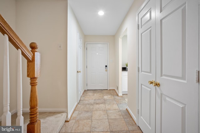 3134 Borge St, Oakton, VA 22124 - hallway with recessed lighting and light stone finish flooring