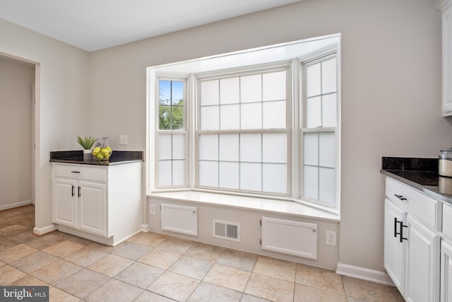 3134 Borge St, Oakton, VA 22124 - unfurnished dining area with baseboards