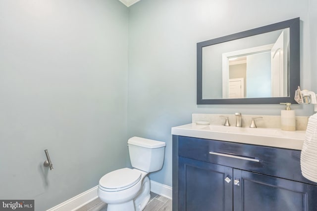 3112 Lancer Dr, Hyattsville, MD 20782 - bathroom featuring vanity and wood finished floors
